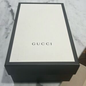 Gucci slingback , black , barely worn in excellent condition . Size 38